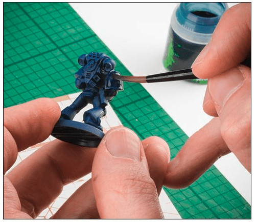 Come dipingere miniature Games Workshop: tecniche di pittura di base